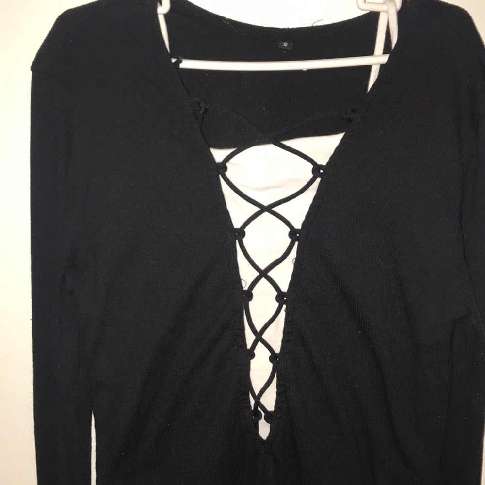 She-in black laced up top